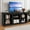 Black, variant on Uforic TV Stand for 80 Inches TV, Farmhouse Entertainment Center with Adjustable Shelf & Storage Cabinets, Washed Gray
