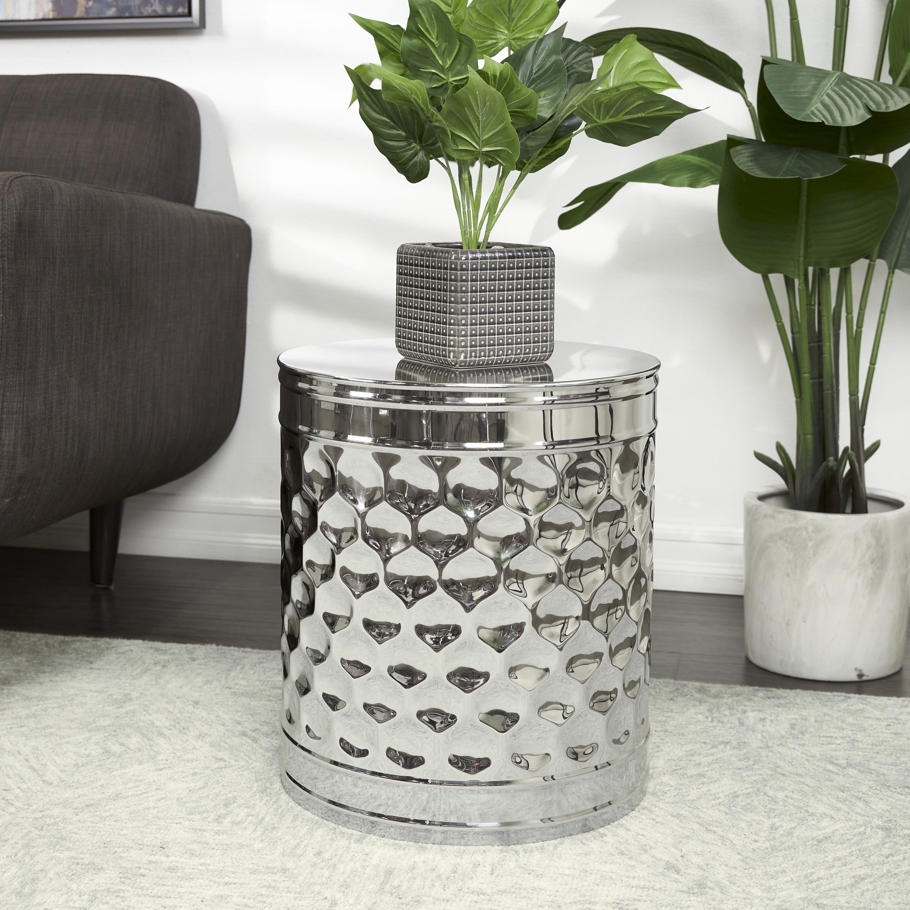 DecMode 16" x 18" Silver Stainless Steel Drum Geometric Accent Table with Hexagon Patterned Exterior, 1-Piece