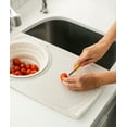 thumbnail image 3 of Dexas Over-the-Sink Flax Cutting Board with Collapsible Colander, 11.5 x 20 inches, Taupe, 3 of 5