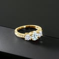 thumbnail image 3 of Gem Stone King 18K Yellow Gold Plated Silver 3-Stone Ring | 7X5MM Oval Aquamarine and 5MM Round White Moissanite | 1.87 Cttw (Size 9), 3 of 4