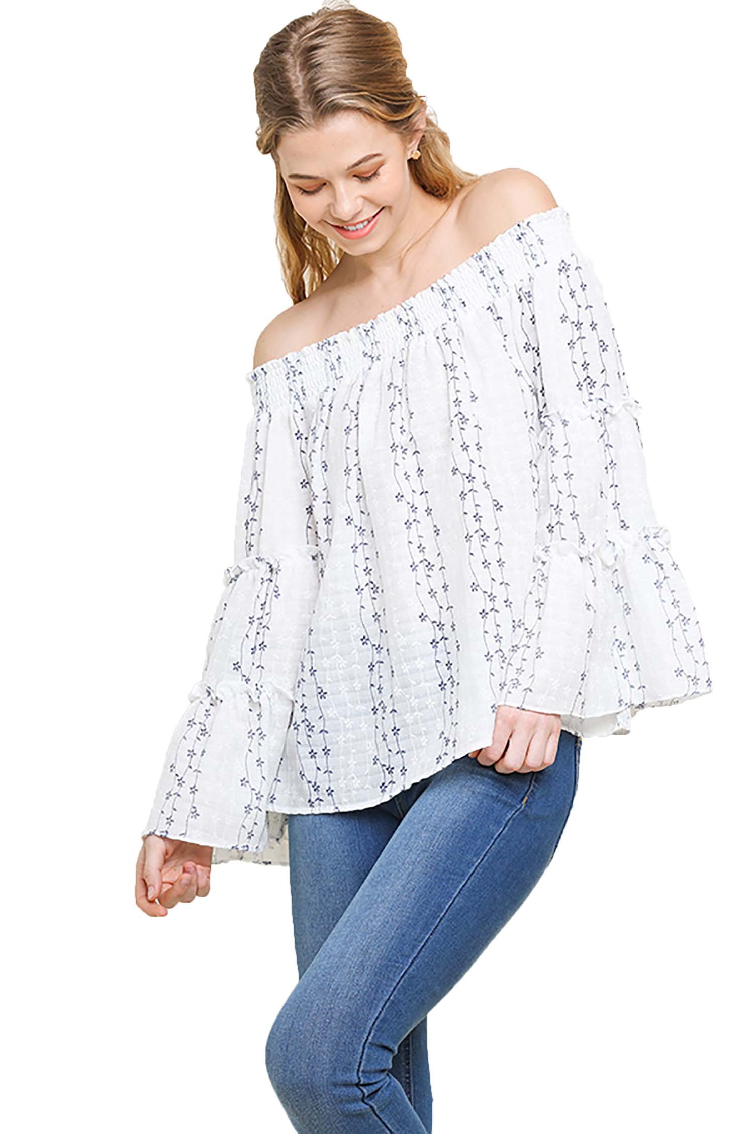 white embroidered off shoulder top