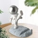 thumbnail image 4 of Soporte de mesa para celular MYRVA diseño de astronauta material de resina, 4 of 4