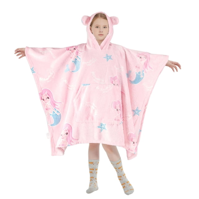 Pink oversized wearable hoodie blanket for kids decorated with blue mermaids and starfish, made of soft plush flannel fleece, featuring a hood with bear ears and giant front pocket.