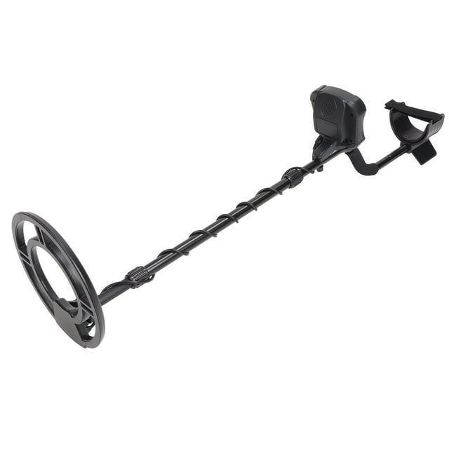 detector de metales nikoumx bobina de 10 pulgadas buscador de oro Detector de metales NikouMX en vista 3/4 con brazo telescópico y bobina circular de 10 pulgadas, carcasa y apoyo de antebrazo en ABS negro, panel con altavoz e indicador LCD visible, sensibilidad y rango ajustables, requiere 2 pilas de 9 V (no incluidas); adecuado para búsqueda recreativa en playas y parques.