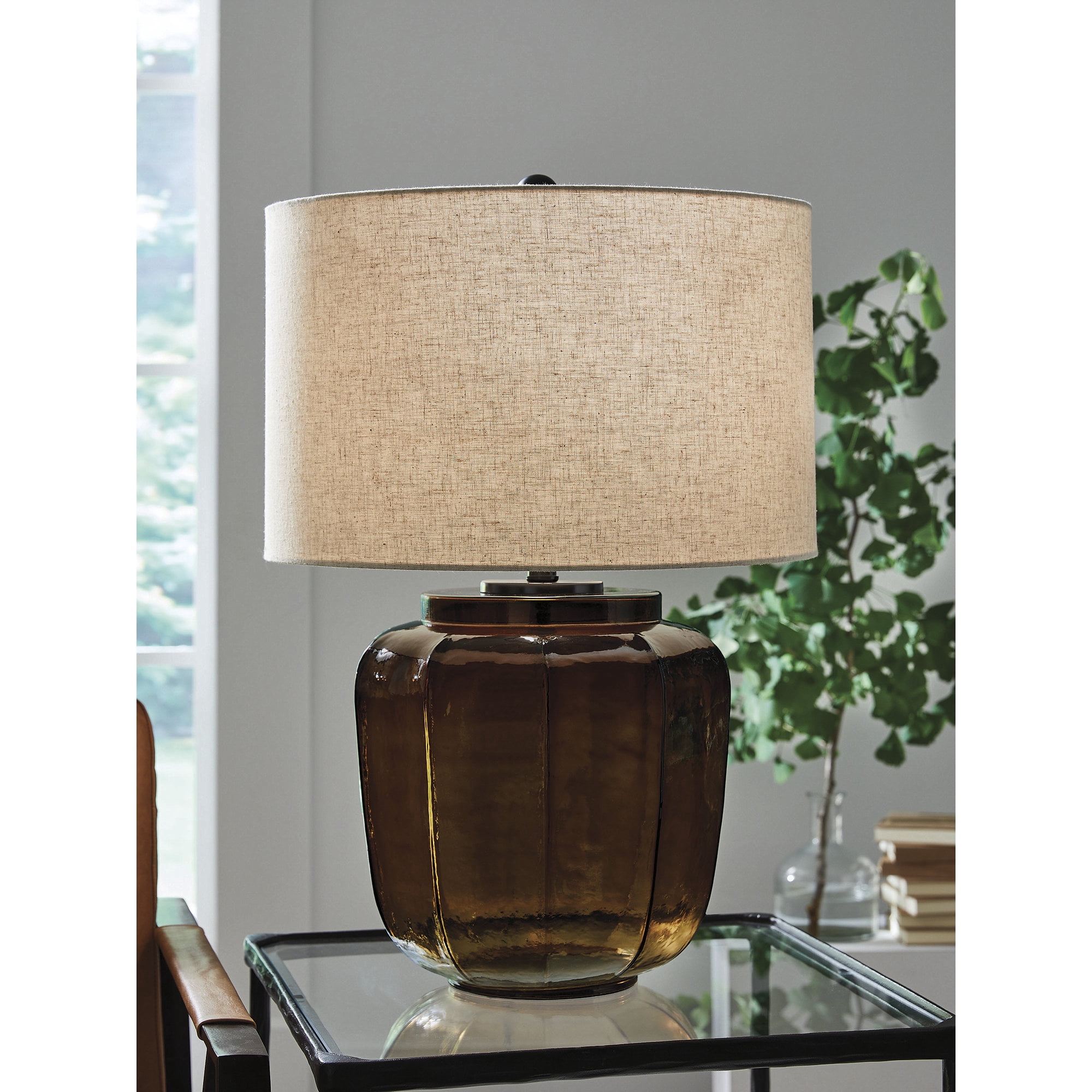 Signature Design by Ashley Bainmore 28" Modern Glass Table Lamp with Drum Shade, Deep Amber Finish, Black Metal, 3‑Way Switch