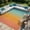Orange and Blue, variant on SUNDEREY Outdoor Rug 8'x10', Waterproof Reversible Plastic Straw Mat for Patio, RV & Camping - Lightweight All-Weather Carpet for Porch, Backyard & Deck, Teal