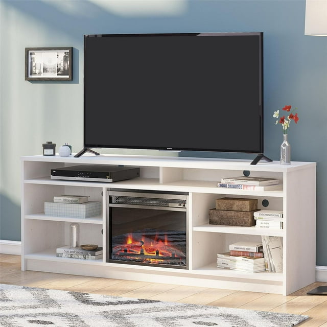 Ameriwood Home Hendrix 65-inch black oak TV stand featuring an electric fireplace insert, six open shelves with books and decorative boxes, supporting a large flat-screen television.