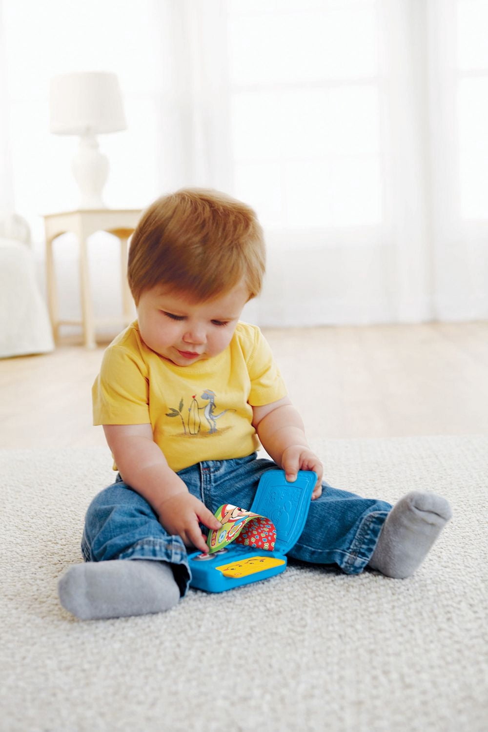 Fisher-Price Rires et Éveil – Portefeuille – Édition anglaise