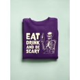 thumbnail image 3 of Eat Drink and Be Scary Skeleton Halloween Graphic - Men's Sweatshirt, 3 of 4