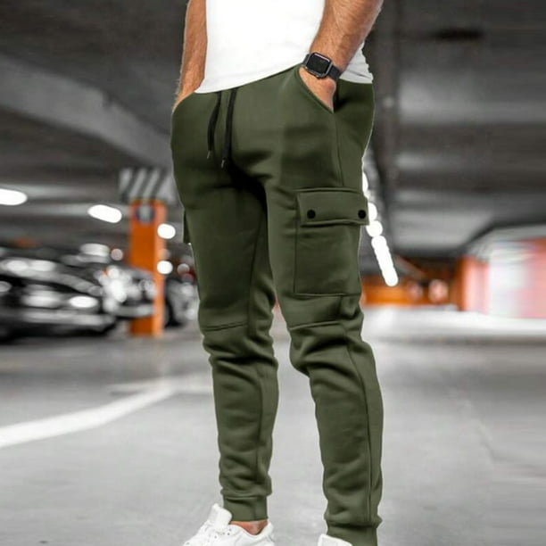Pantalones largos de moda para hombre, casuales, de color sólido, con bolsillos y cremallera, cintura elástica, de poliéster.