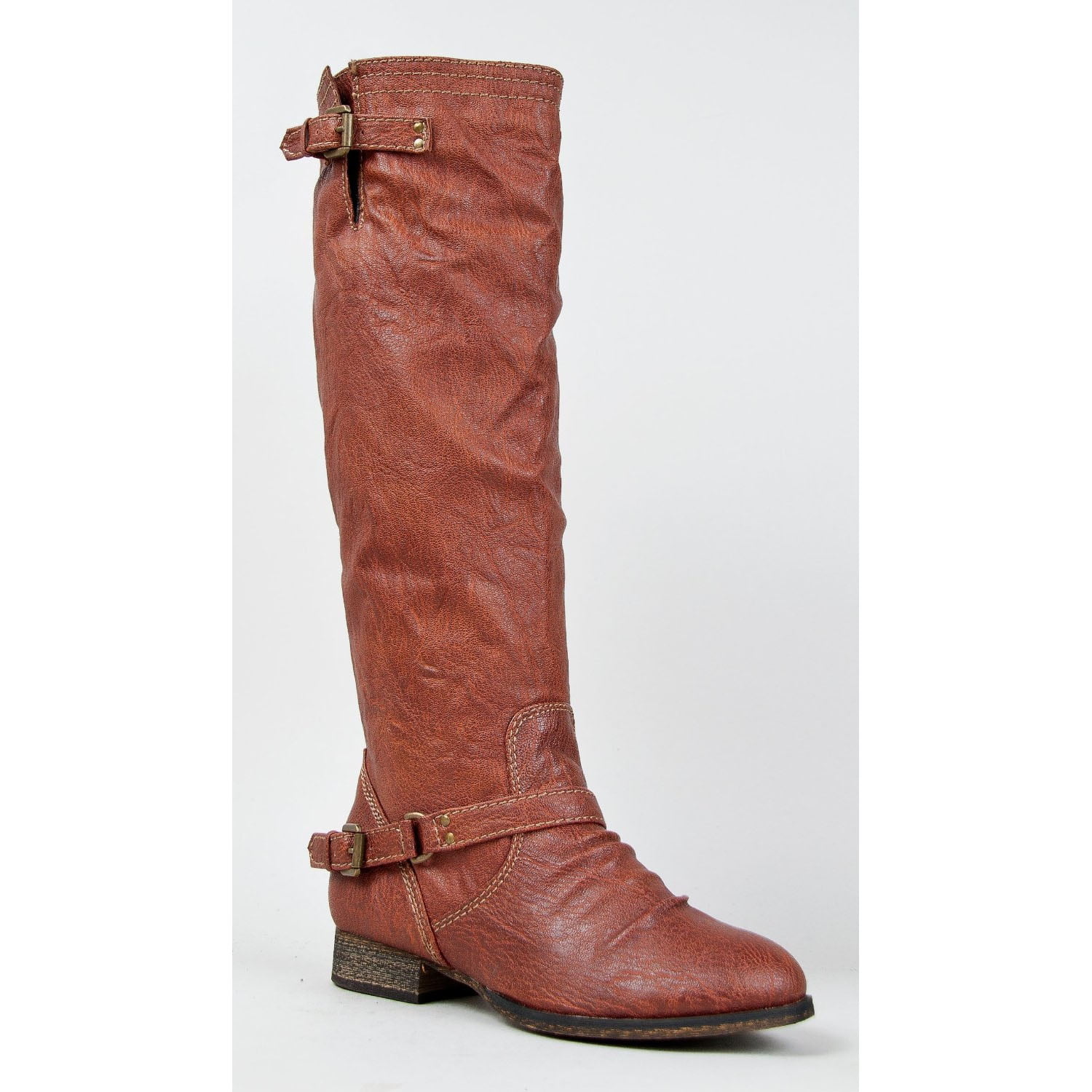 tall brown boots with red zipper