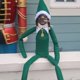thumbnail image 1 of Elfo de Navidad vendedor caliente con gafas de sol y sosteniendo un cigarrillo de muñeca encorvado en el estante, adornos para el hogar, 1 of 3