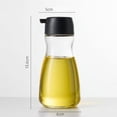 thumbnail image 1 of Botella dispensadora de aceite de sésamo de vidrio con control de volumen, perfecta for condimentar y cocinar, 1 of 2