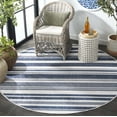 thumbnail image 3 of SAFAVIEH Beach House Merrilyn Striped Indoor/Outdoor Area Rug, Navy/Ivory, 6'7" x 6'7" Round, 3 of 14