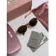 thumbnail image 4 of Miu Miu MU 52Y sunglasses with oval logo, gold frame, tan lenses, with case, 4 of 6