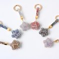 thumbnail image 1 of Llaveros de estrella NQ con borla de diamantes de imitación color aleatorio, 1 of 5
