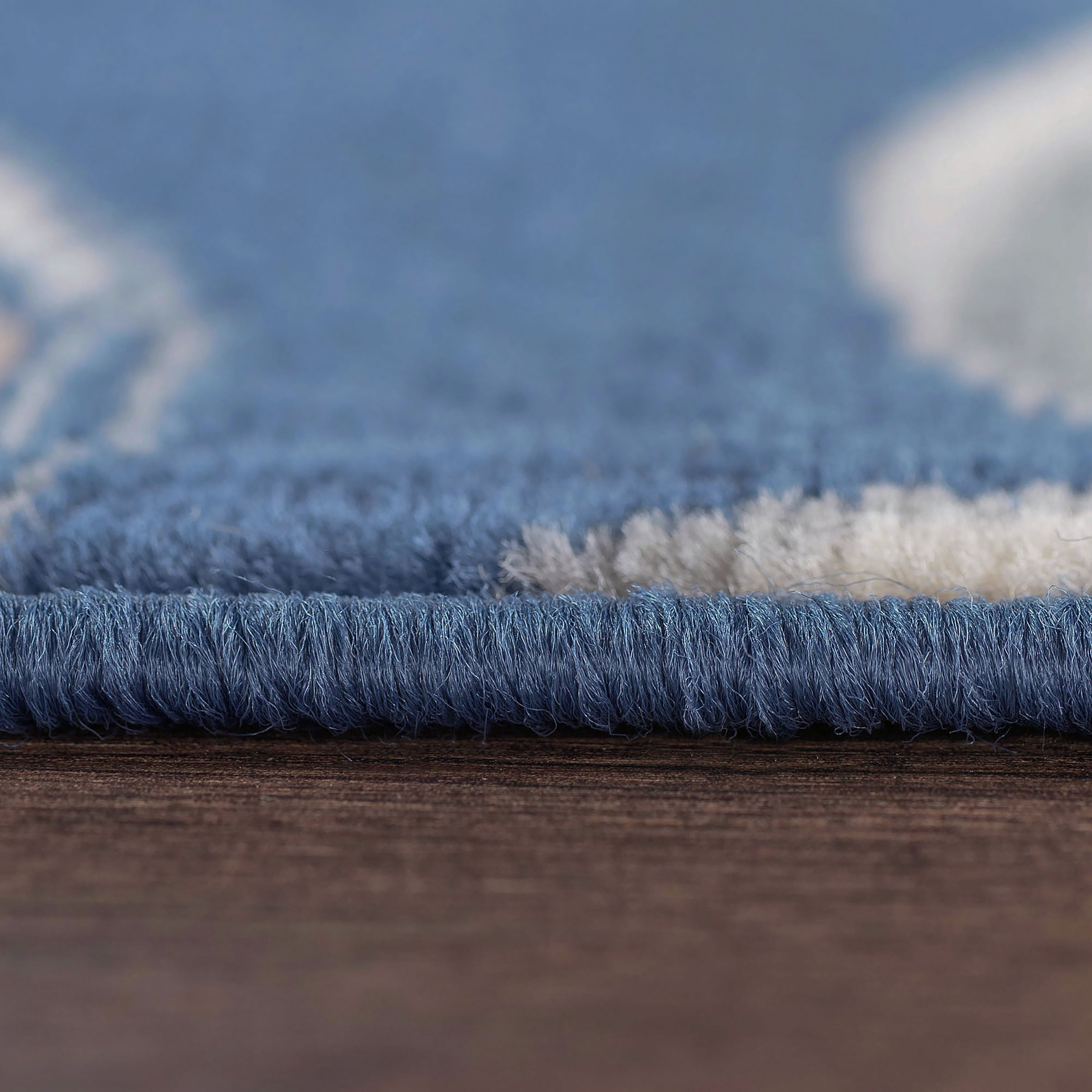 Madison Transitional 9' x 12' Navy and Cream Polypropylene Indoor Area Rug