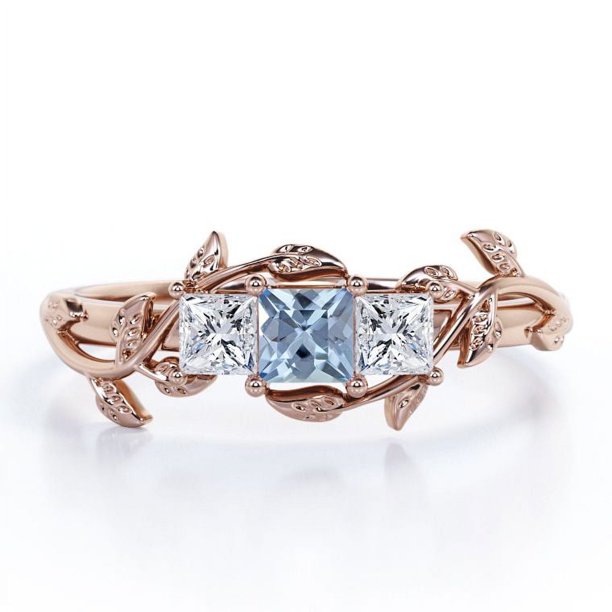 JeenMata Anillo de Compromiso de Triple Piedra con Aguamarina y Moissanita Creadas en Laboratorio de 1 Quilate con Corte Princesa y Hoja de Parra Chapado en Oro Rosa de 18 K sobre Plata