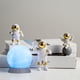 thumbnail image 3 of Estatuilla de astronauta Colco adorno creativo 4 piezas Decoración para hogar colecciones, 3 of 8