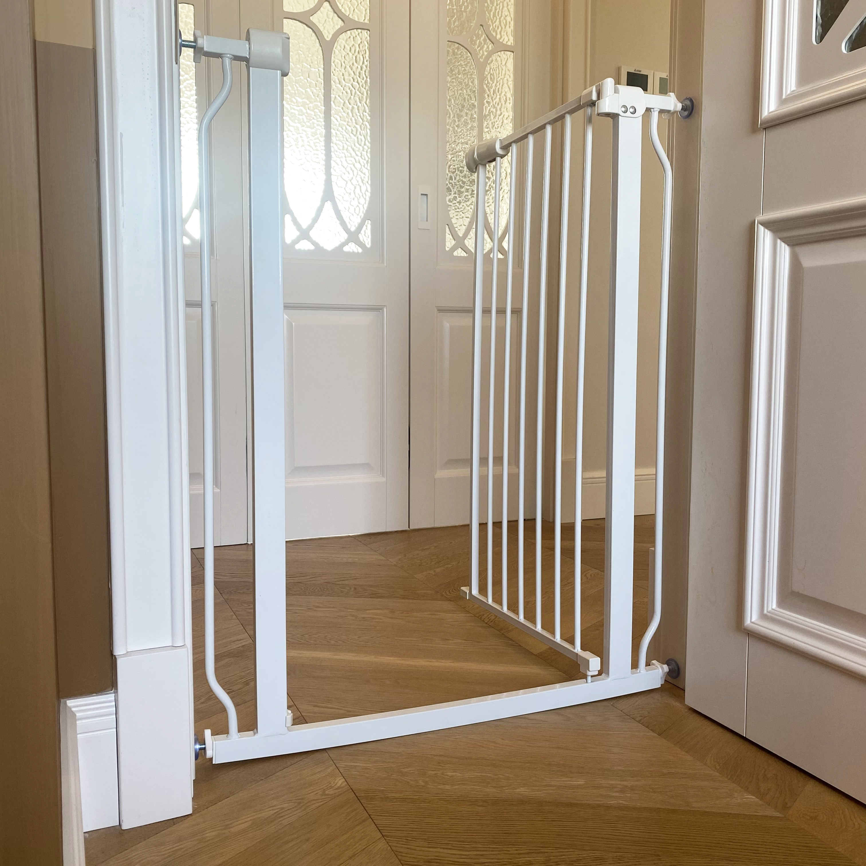 Elevon Easy Walk Through Safety Gate for Doorways and Stairways with Auto Close and Hold Open Features with Wall Caps, Fits Opening Between 29.1 to 33.8 Inches, 36-Inch High