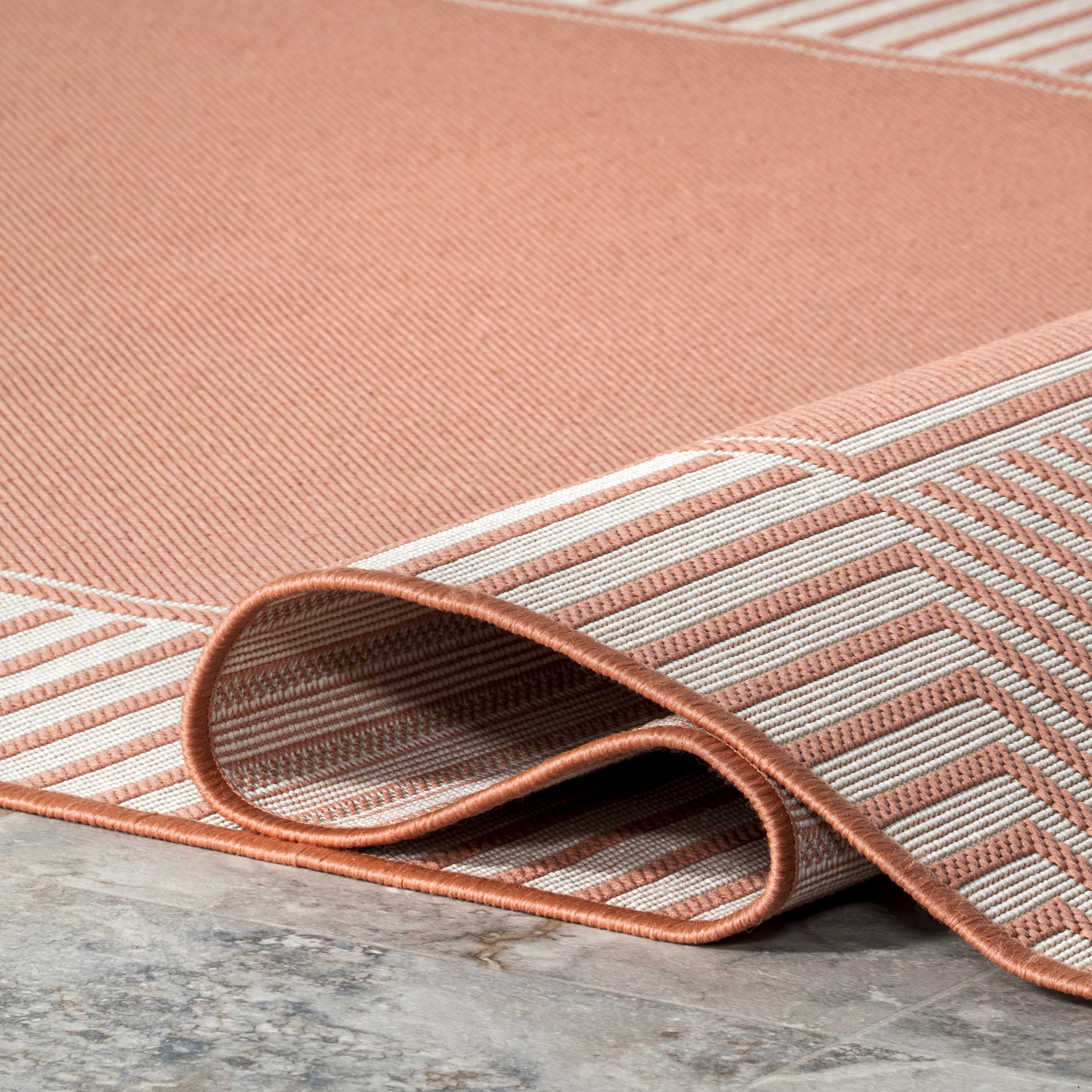 nuLOOM Asha Simple Border Indoor/Outdoor Coral 6' 7" x 9' Casual Area Rug