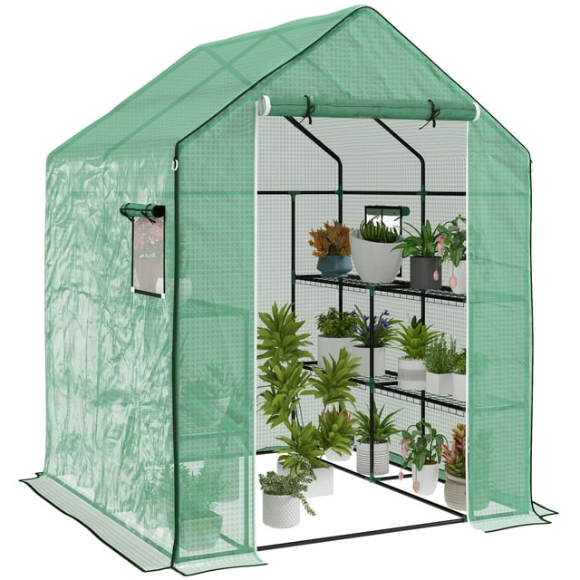 Outsunny Serre à Entrée Piétonne avec 8 Tablettes, Dotée d'Une Housse en Polyéthylène Verte Résistante aux UV, d'Une Porte à Fermeture Éclair Enroulable et de Deux Fenêtres en Treillis pour la ventilation. Idéale pour Protéger les Plantes à l'Extérieur, Elle Comprend des Supports à Plantes à Trois Niveaux des Deux Côtés, des Panneaux en Treillis Personnalisables et un Grand Espace pour le Jardinage. Mesure 140 x 143 x 190 cm, avec Piquets de Sol et Cordes Hauban pour la Stabilité.