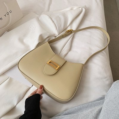 Bolsos para mujer 2025, nuevo estilo, diseño de nicho, bolso baguette de verano de alta calidad, bolso de hombro bajo el brazo de gran capacidad.