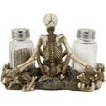 thumbnail image 4 of Ebros Meditating Skeleton On Graveyard Of Skulls Salt & Pepper Shakers Holder, 4 of 10