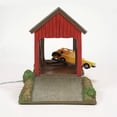 thumbnail image 3 of Department 56 Beetlejuice The Winter River Bridge Building LED Lit Resin Figurine 6in H, 3 of 5