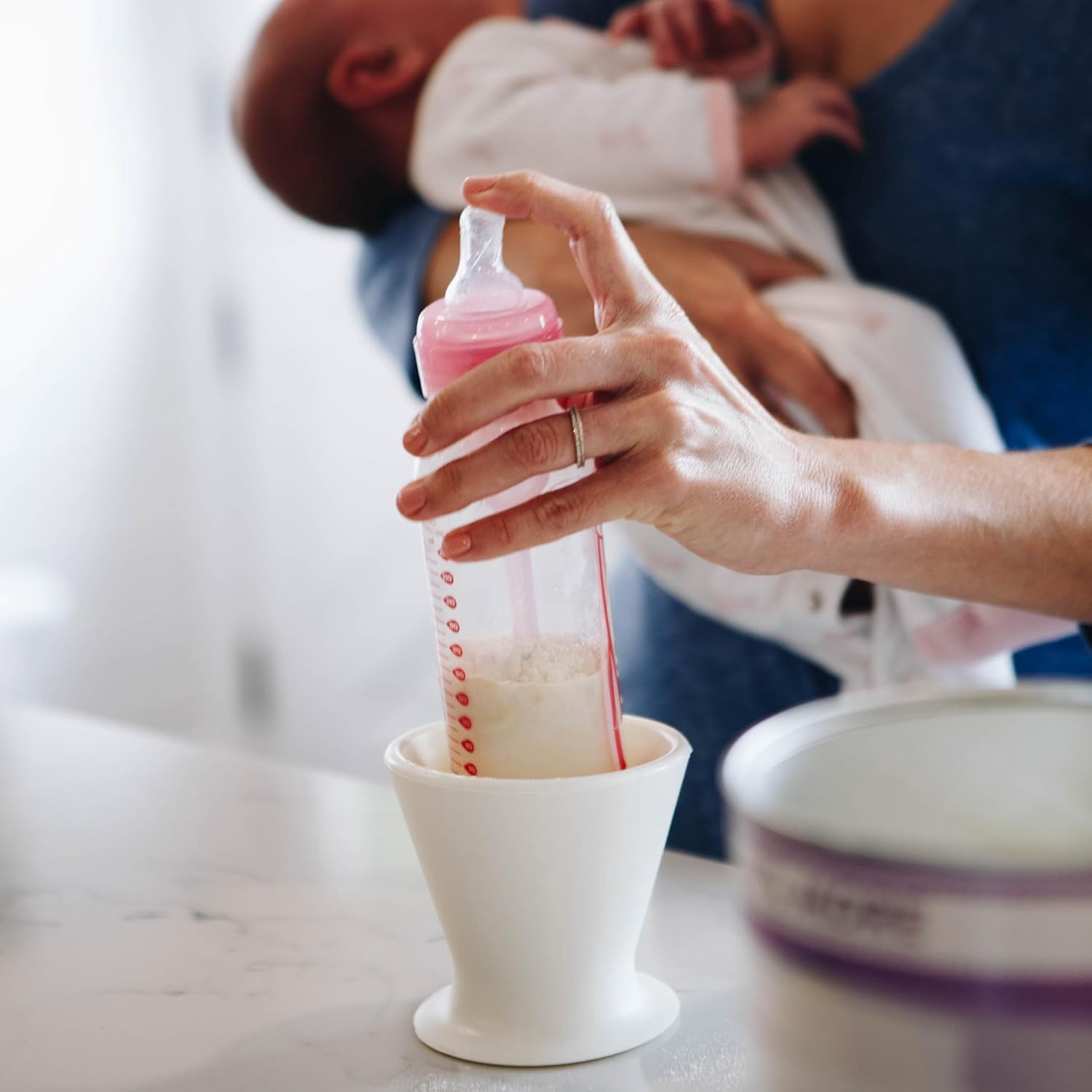Bökee Baby Bottle and Breast Pump Holder and Snack Bowl – Silicone One Hand Milk & Formula Prep with Suction Cup - Dishwasher Safe - White, 1-Pack