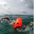 thumbnail image 3 of New Wave Swim Buoy - Swim Safety Float and Drybag for Open Water Swimmers, Triathletes, Kayakers and Snorkelers, Highly Visible Buoy Float for Safe Swim Training (Orange PVC Medium 15L), 3 of 9