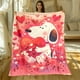 thumbnail image 2 of Manta con estampado de dibujos animados lindo Snoopy de MINISO. Franela cálida y cómoda, dormitorio, sofá, cama, silla, regalo, picnics, viajes, campamento, mantas., 2 of 5