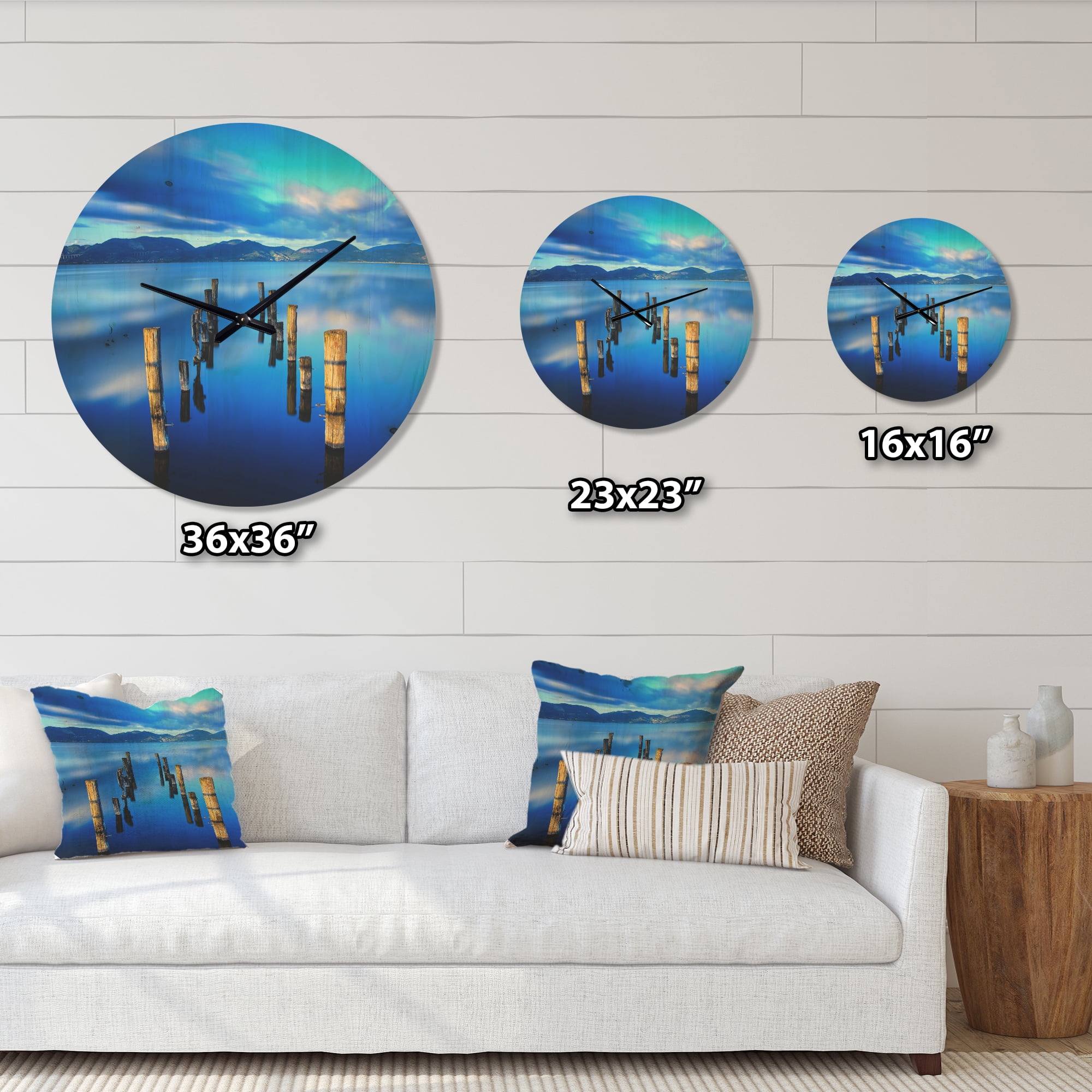 Designart 'Wooden Pier Remains in Blue Mountain Sea ' Modern Wood Wall Clock