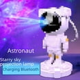thumbnail image 3 of Lámpara de proyección de estrellas con astronauta, auroras boreales, robot Gypsos, proyector, guitarra con estrellas y Bluetooth, 3 of 3