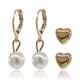 thumbnail image 2 of Set de dos pares aretes tipo broquel CYRA modelo corazón y perla, 2 of 3