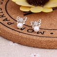 thumbnail image 4 of Pendientes de botón para estudiantes femeninas, estilo coreano, personalidad simple, temperamento, lindas joyas para las orejas antialérgicas, pendientes de moda que combinan con todo, 4 of 5