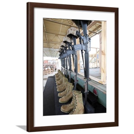 Wood Helmet Stand Boots, Rifles, Dog Tags, And Protective Helmets Stand in Solitude To Honor Fallen Soldiers Framed Print Wall Art By Stocktrek Images ()