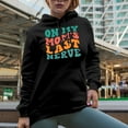 thumbnail image 2 of On My Mom's Last Nerve, Funny Quote for a Son or Daughter, Groovy Retro Wavy Text Merch Gift, Black Hooded Sweatshirt or Hoodie, Medium, 2 of 5