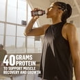 thumbnail image 4 of Muscle Milk Pro Advanced Nutrition Protein Shake, Knockout Chocolate, 14 Fl Oz Bottle, 12 Pack, 40g Protein, 1g Sugar, 16 Vitamins & Minerals, 6g Fiber, Workout Recovery, Packaging May Vary, 4 of 5