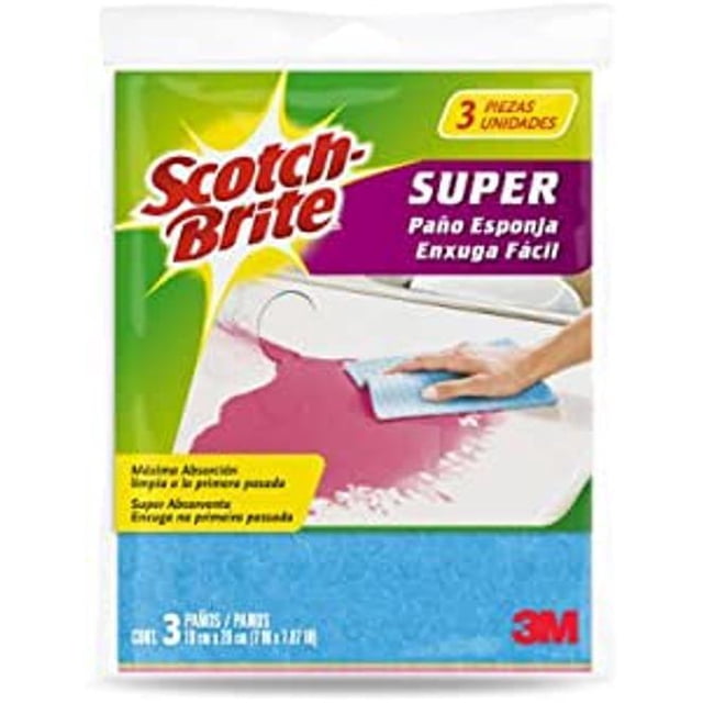 paño esponja scotch-brite multicolor 3 und Empaque frontal con 3 paños azules de microfibra 20 x 18 cm; logo Scotch-Brite y leyenda "SUPER Paño Esponja" visibles; mano limpiando un derrame rosa, textura absorbente aparente; apto para cocina o baño y también suele usarse para secar pequeños utensilios.