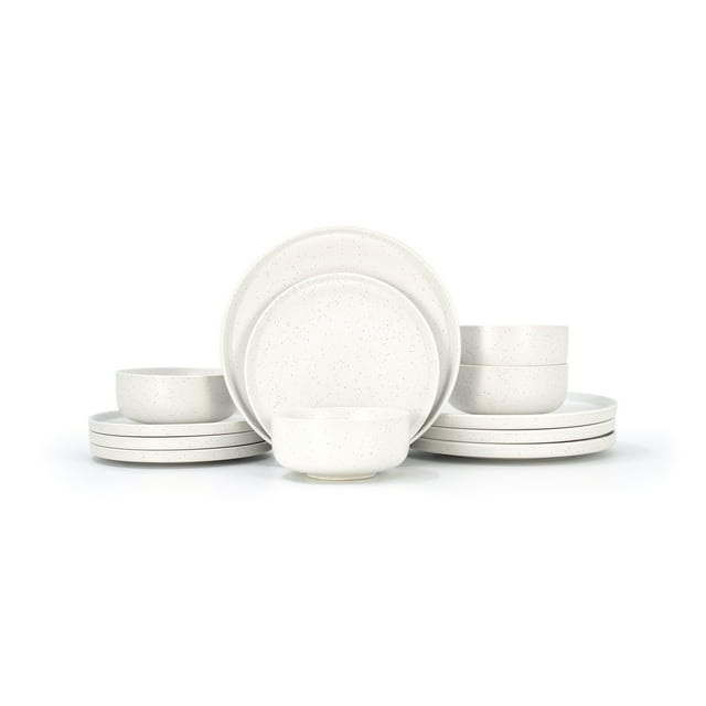 Sabatier Luna white speckled 12-piece dinnerware set including plates and bowls arranged on a white background.