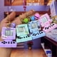 thumbnail image 2 of Mini computadora portátil creativa, máquina de juegos electrónica pequeña, llavero, bolso de moda exquisito, colgante pequeño informal, 2 of 6
