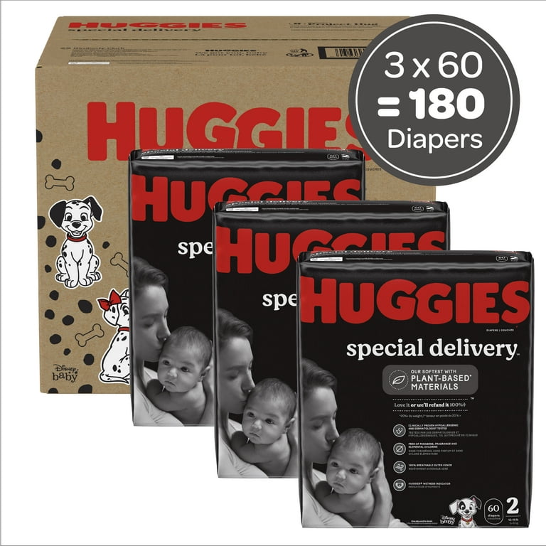 Infant wearing Huggies baby diaper with yellow line turning blue