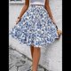 thumbnail image 4 of Falda de Mujer con Estampado Floral, Dobladillo con Volantes, Cintura Alta Elástica y Lazo Frontal. Azul Pavo Real XL, 4 of 10