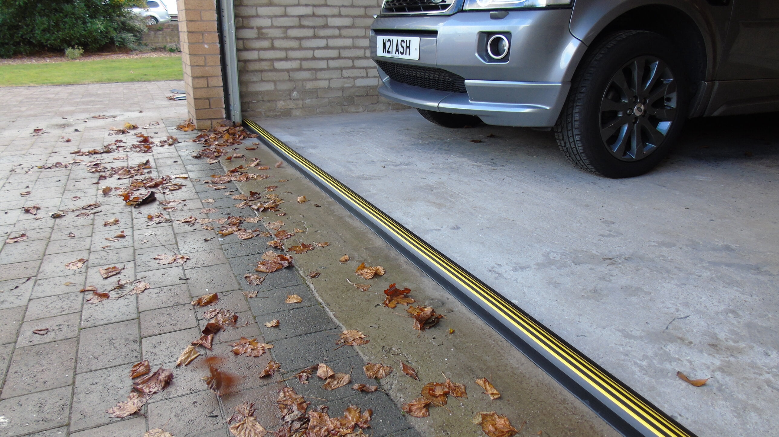 1 ¼” High Garage Door Threshold Seal Kit 8'3" Length | Flexible PVC | Complete Kit Includes 1 Adhesive | GaraDry
