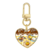 thumbnail image 1 of La hora del té con galletas de chocolate Llavero de metal en forma de corazón dorado, 1 of 3