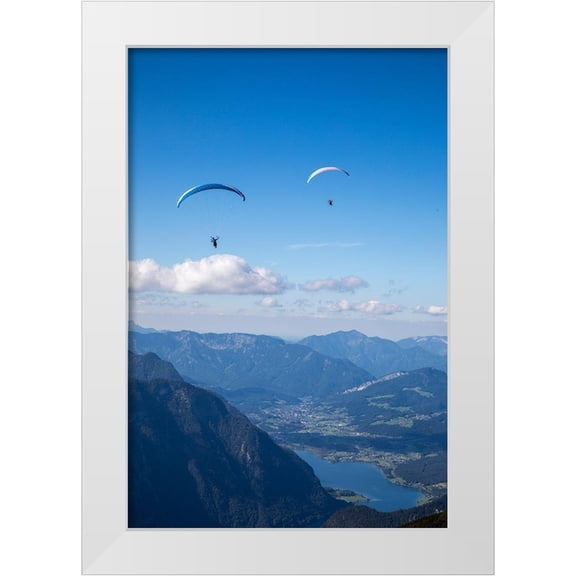 Looney, Hollice 17x24 White Modern Wood Framed Museum Art Print Titled - Austria-Dachstein-Paragliders as they soar above Lake Hallstatt and the surrounding mountains