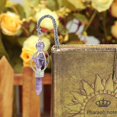 thumbnail image 4 of Marcapáginas de metal vintage yuxing con colgante de piedra preciosa cristal morado, 4 of 5