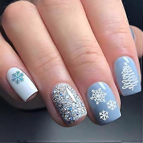 carufin 24 pcs christmas press on nails short fake nails red and white stripes acrylic nails cute elk snowflake full cover false nails xmas nail (c) A centered close-up of four short full-cover press-on nails on natural fingers with holiday designs: white nail with a blue snowflake decal, dense silver glitter accent nail, light blue nail with white snowflake decals, and light blue nail with a white stylized Christmas tree. Suitable for uñas postizas navideñas y decoración de uñas.