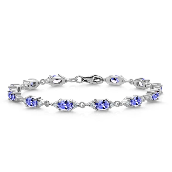 Gem Stone King 925 Sterling Silver Blue Tanzanite and White Moissanite Tennis Bracelet for Women (6.31 Cttw, Gemstone Birthstone, Oval 6X4MM, 7.5 inch)